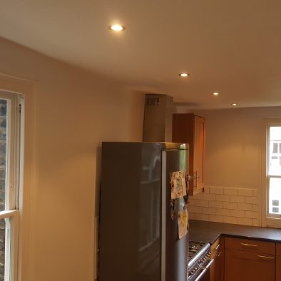 finished wall after strip down affected area, apply damp treatment, apply filler, sanding, redecorate